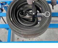 Tire trippling machine